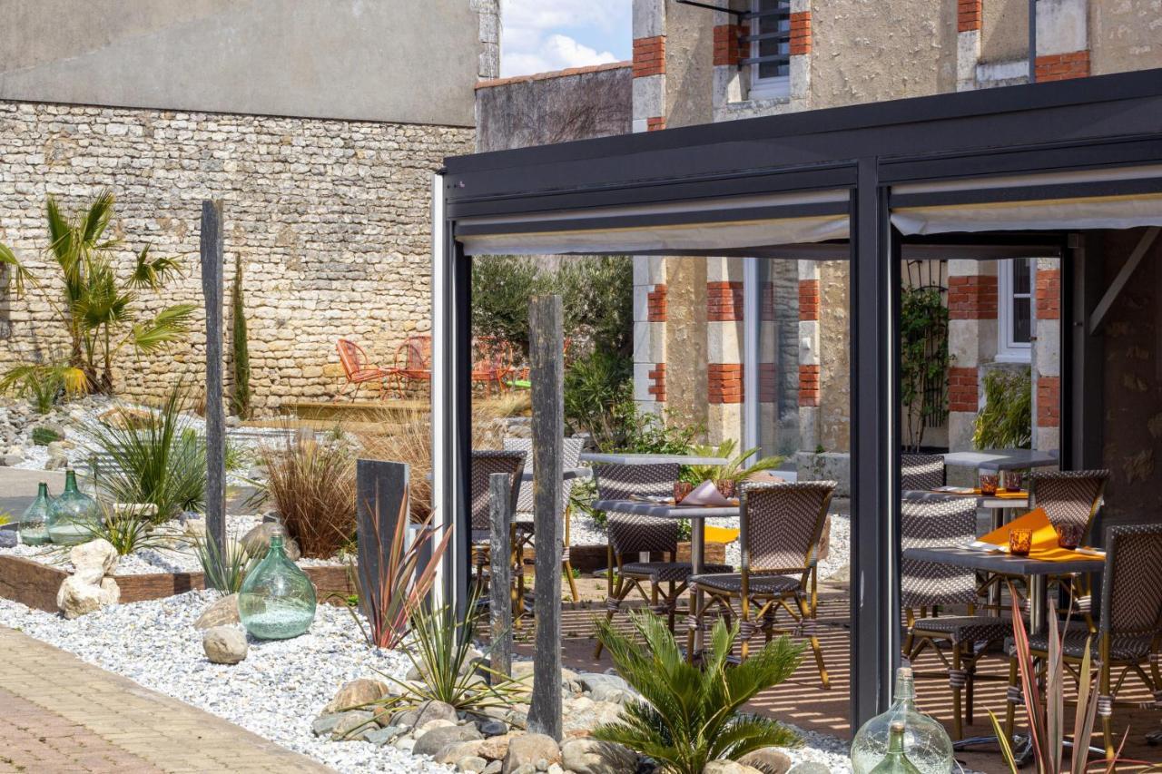 סוז'ון Cit'Hotel Le Commerce מראה חיצוני תמונה