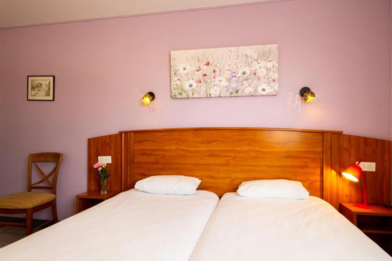 סוז'ון Cit'Hotel Le Commerce מראה חיצוני תמונה