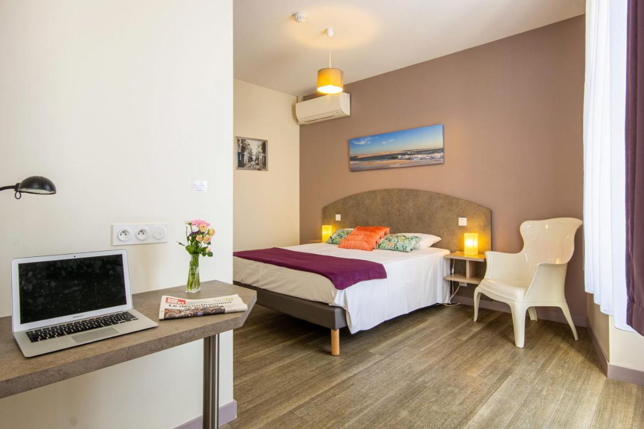 סוז'ון Cit'Hotel Le Commerce מראה חיצוני תמונה